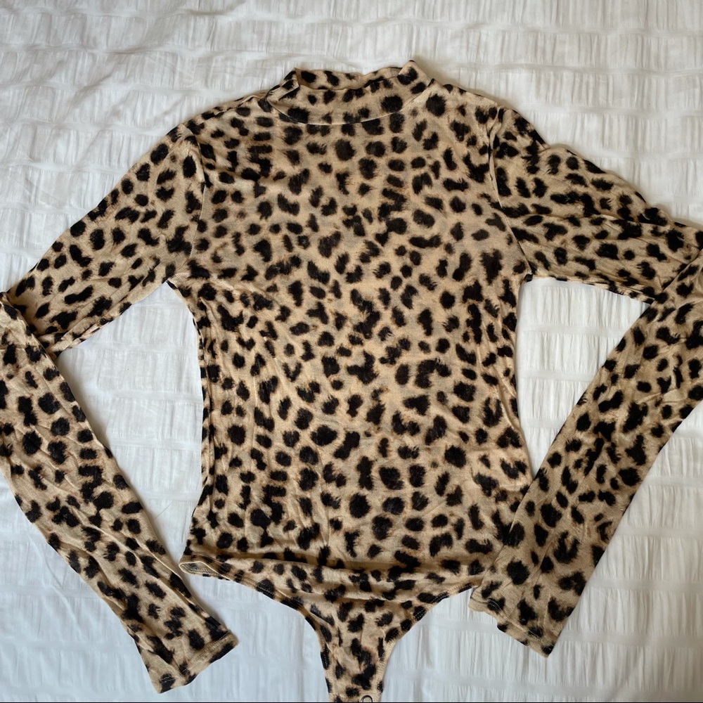 Express cheetah turtleneck bodysuit